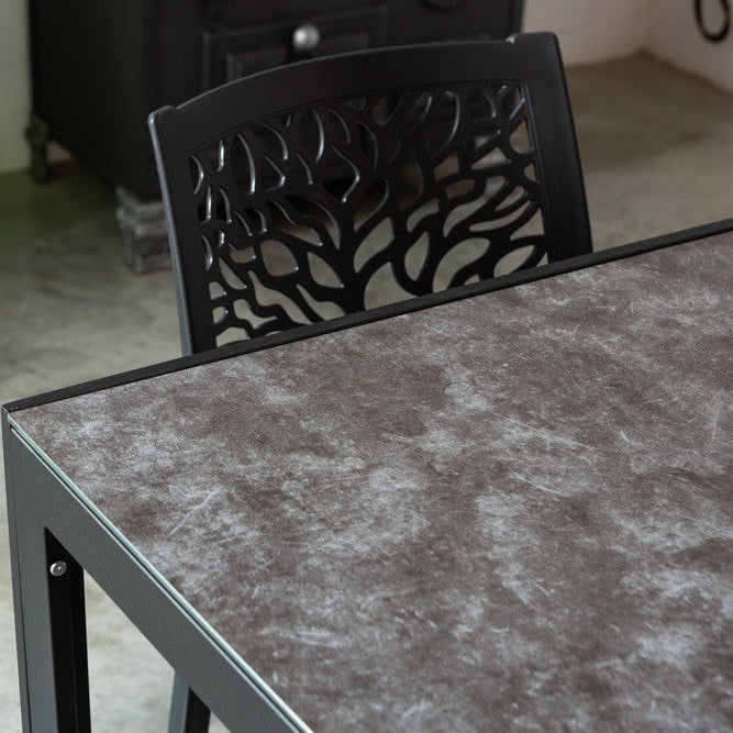 Milo – tavolo in alluminio con piano in vetro decorato