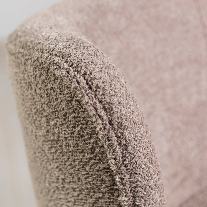 Irene – poltrona in tessuto bouclé con struttura a molle