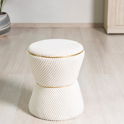 Kora – pouf in velluto a clessidra con profilo dorato