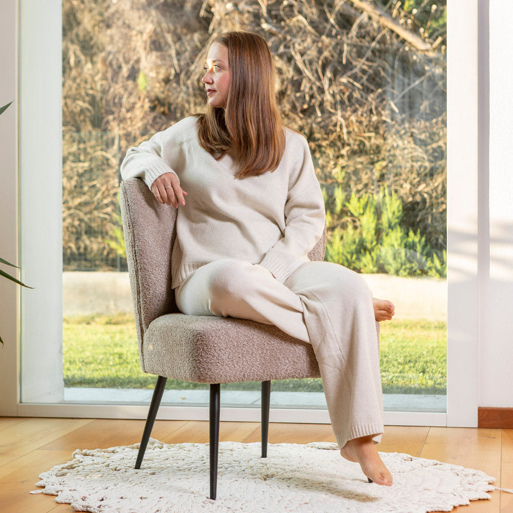 Irene – poltrona in tessuto bouclé con struttura a molle