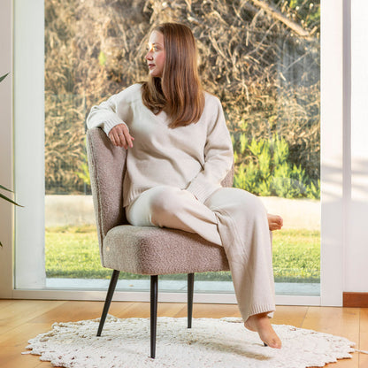 Irene – poltrona in tessuto bouclé con struttura a molle